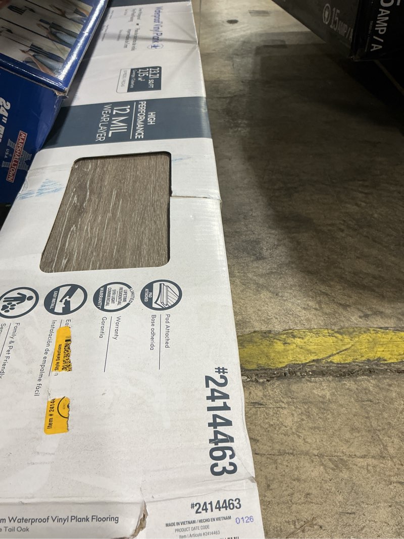 Condition photo showing As Is for style selections dove tail oak gray 12-mil x 7-in w x 48-in l waterproof interlocking luxury vinyl plank flooring (23.21-sq ft/ carton)