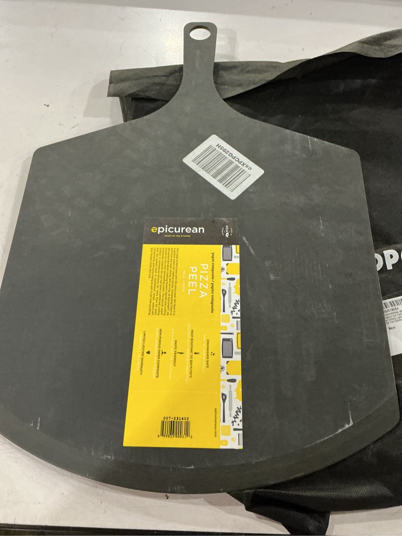 Condition photo showing Good Condition for epicurean, 21" x 14", slate riveted handled pizza peel, 007-r21140202 rivet handle 21" x 14" slate