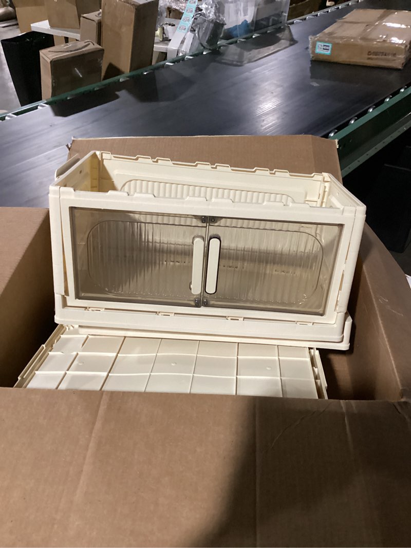 Condition photo showing New/Like New for 19.69 in. l x 11.81 in. w x 31.1 in. h 3 tier wide folding storage cabinet with wheels and magnetic door