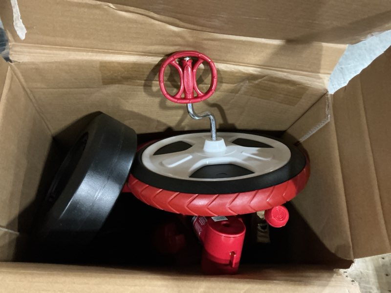 Condition photo showing As Is for radio flyer, twist trike, 2 tricycles in 1, for boys and girls 2-7 years