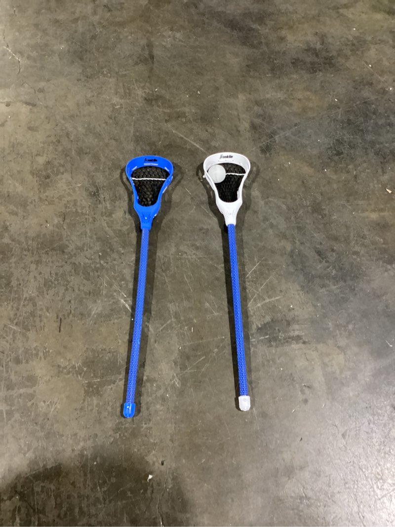 Condition photo showing As Is for (Similar To)Franklin Sports Mini Lacrosse Set – 2 Mini Sticks & Ball – Indoor Outdoor Backyard Beach Game – 18” Lacrosse Sticks for Kids & Teens – Portable Safe Fun Toy – Mini-Lax Set