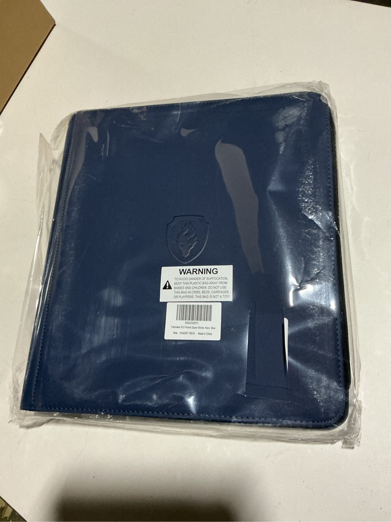 Condition photo showing As Is for Premium Zip Card Binder 12 Pocket, Fabmaker 912 Pockets Trading Card Binder, PU Zipper Card Collection Album, Sturdy Side-Loading Card Book Holder for Game & Sports Cards, Navy Blue 12 Pocket - 15" x 13.6" Navy Blue