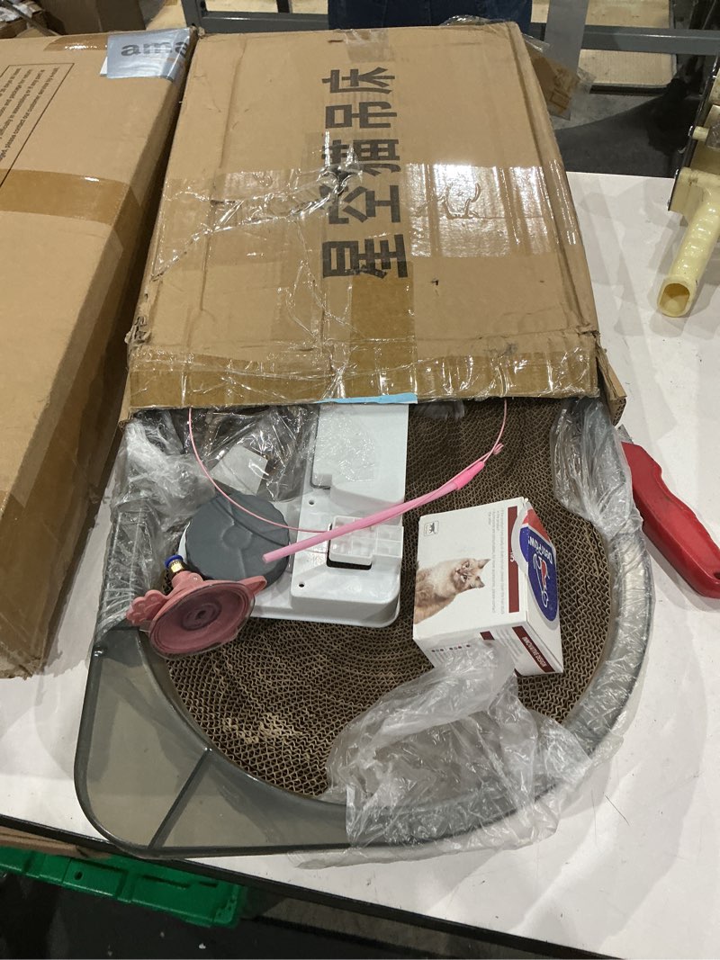 Condition photo showing As Is for 3-in-1 cat toy and cat window perch, window-mounted hammock with scratching board, interactive teaser wand, smart ball with led lights
