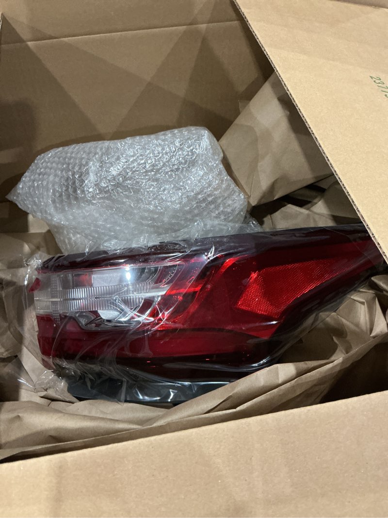 Condition photo showing As Is for replacement driver-side tail light assembly for a 2010-2013 toyota 4runner. 