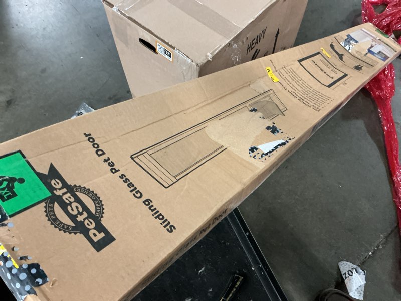 Condition photo showing As Is for petsafe freedom dog and cat aluminum patio panel - medium - white: door mounted, weather-resistant, adjustable