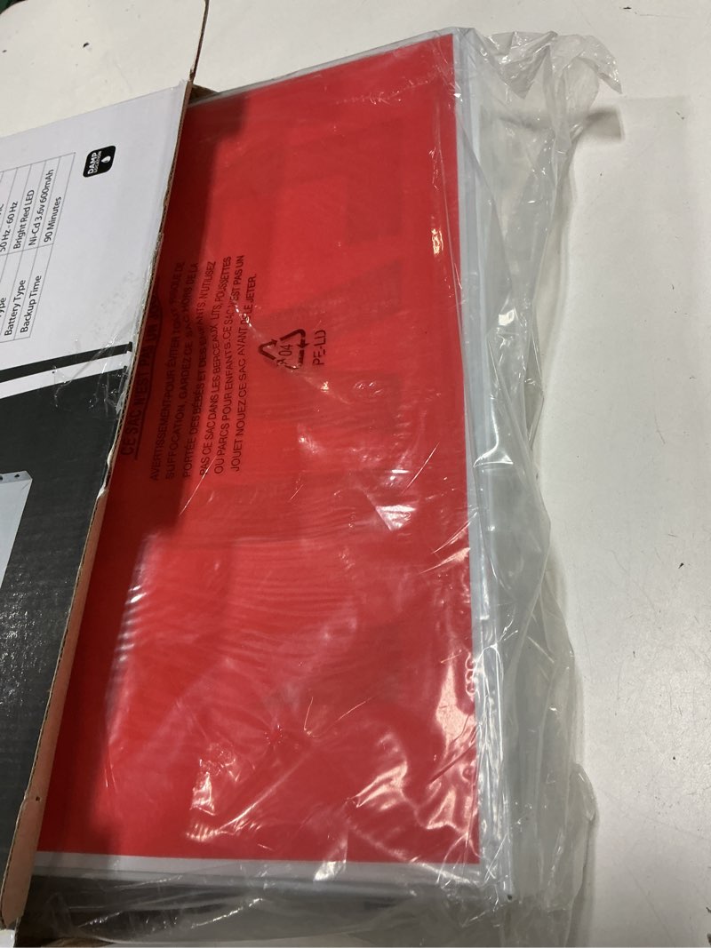 Condition photo showing Good Condition for tanlux new york approved emergency exit sign, red exit sign with steel housing, hardwired with battery backup, ac 120/277v, single and double faces, ul listed