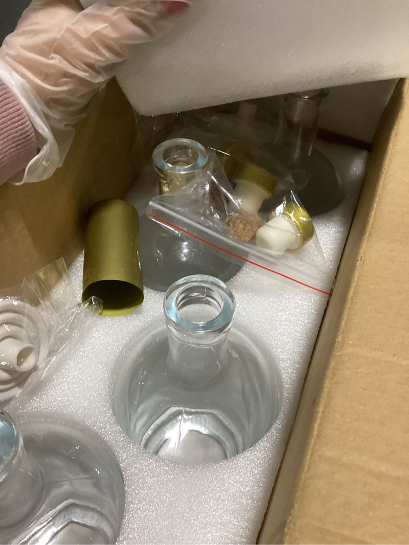 Condition photo showing Good Condition for 33 oz Clear Glass Bottles with Cork, 4 Pack Clear 1000ml Liquor Bottles, Thick Heavy Base Airtight Wine Bottles for Beverages, Liquor, Whiskey, Oil, Vinegar, Wedding Favors & Crafts Clear 33oz/ 1000ml