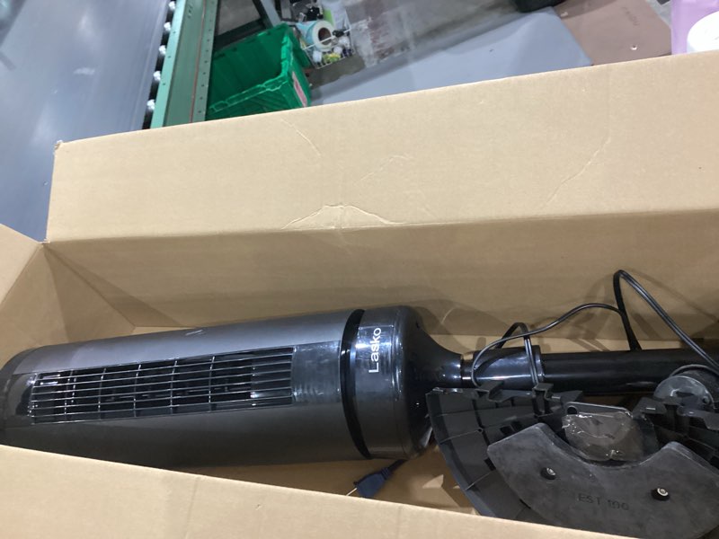 Condition photo showing As Is for lasko elevation adjustable tower fan 42”-54”, pedestal fan, 31 ft/s airflow, quiet 28 db, 90° oscillation, 12h timer, remote, black, est100
