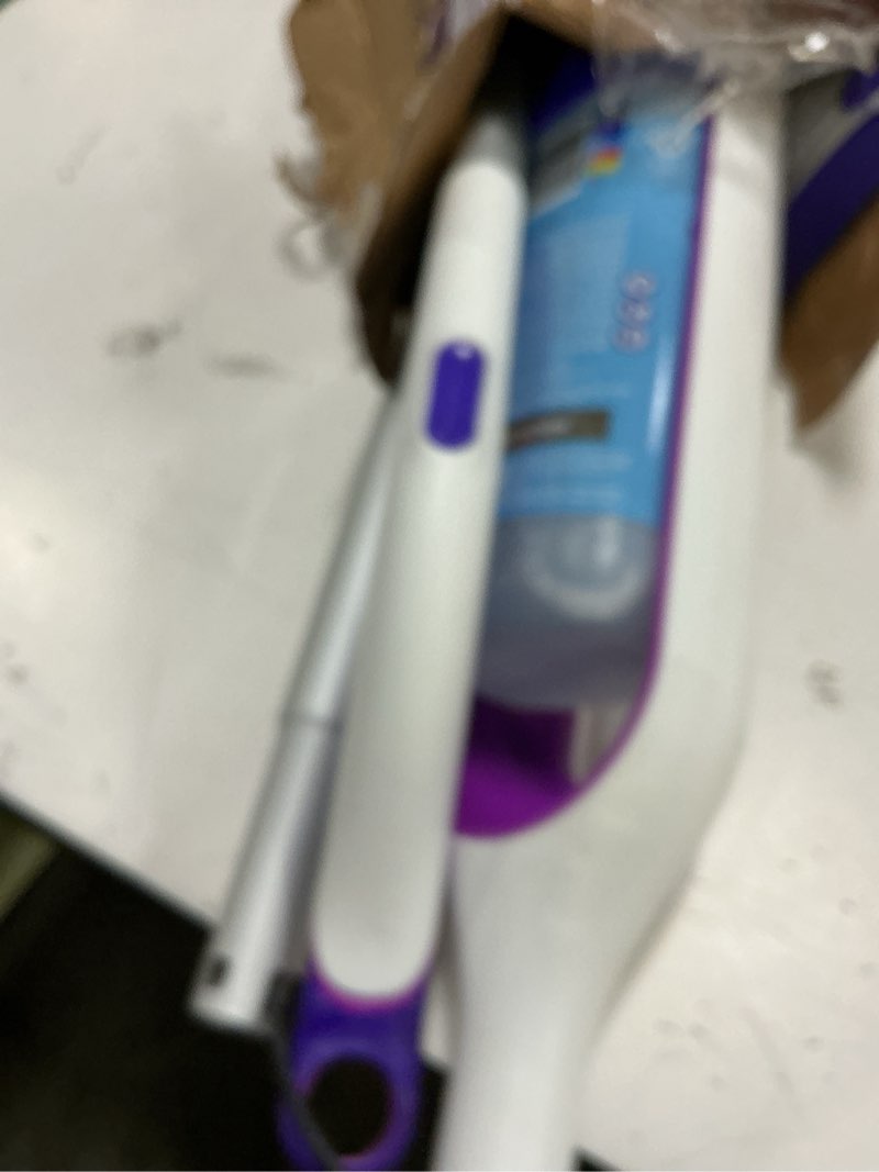 Condition photo showing New/Like New for swiffer powermop multi-surface mop kit for floor cleaning, includes powermop, 2 mopping pad refills, 1 cleaning solution with fresh scent and 2 batteries purple and white