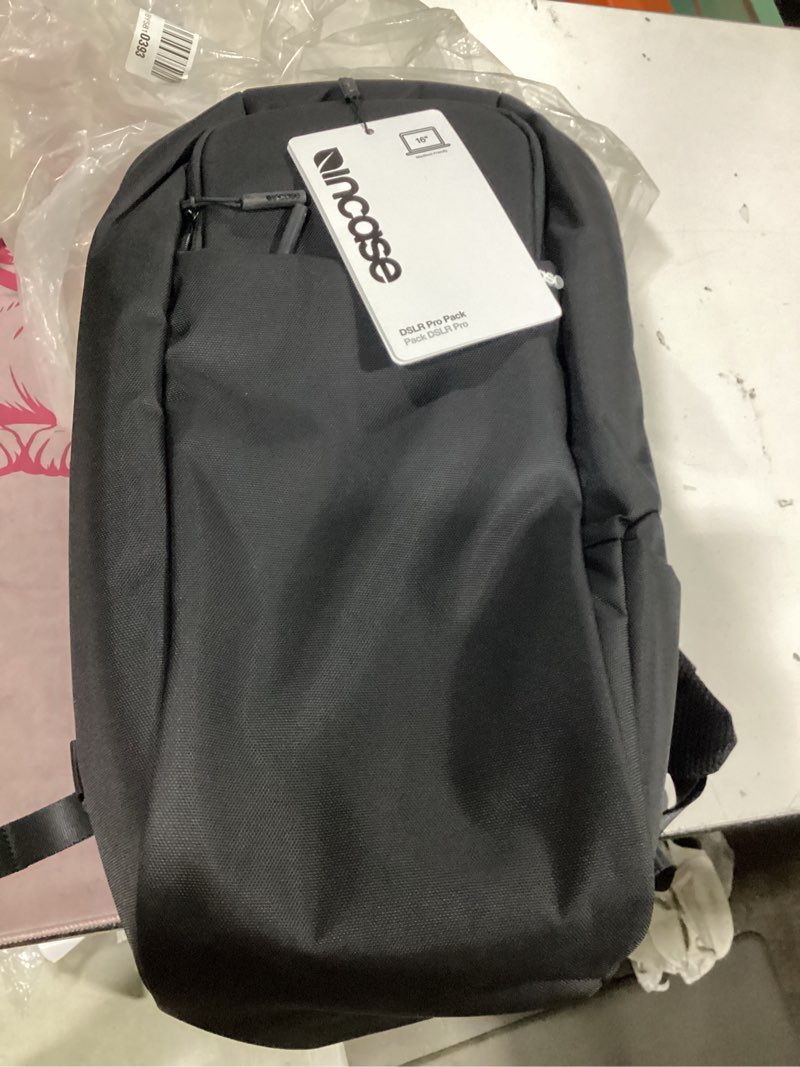 Condition photo showing New/Like New for incase dslr backpack with durable 840d nylon - 26l weather resistant camera bag designed for photographers and videographers, customizable dividers to secure all equipment, quick access pocket - black