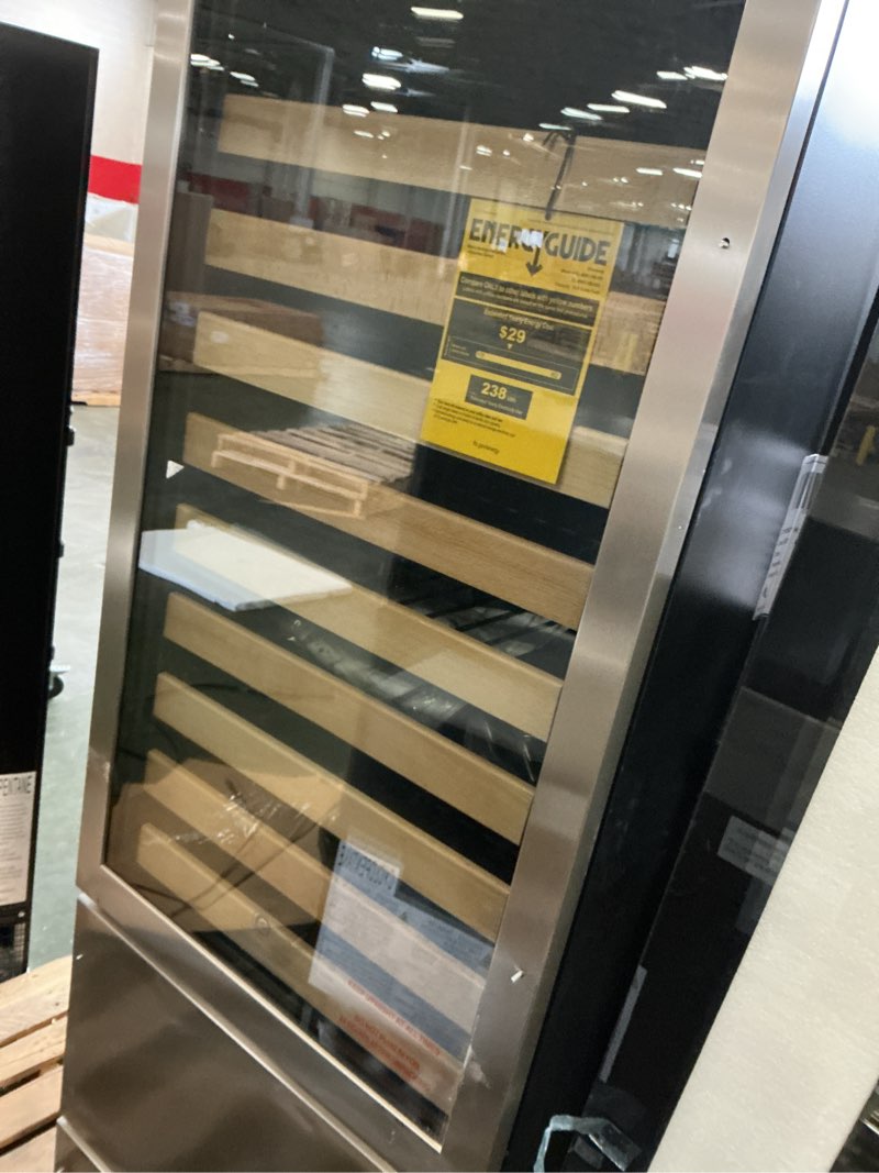 Condition photo showing As Is for Vinotemp 23.8-in W 100 -Can Capacity Stainless Steel Built-in/Freestanding Indoor Beverage Refrigerator with Glass Door