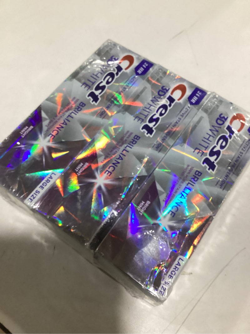 Condition photo showing New/Like New for Crest 3D White Brilliance Bright Mint Teeth Whitening Toothpaste, 4.3 oz Pack of 3, 100% More Surface Stain Removal, 24 Hour Active Stain Prevention, Whiter Teeth in 3 Days