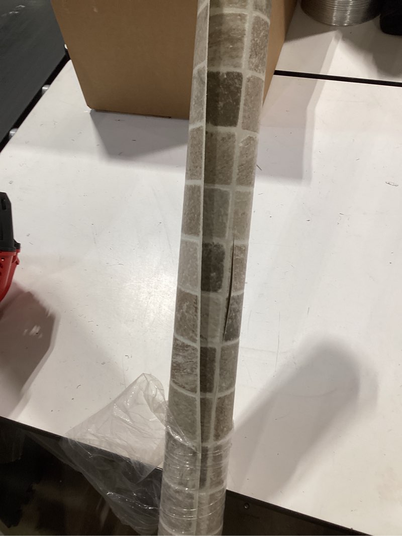 Condition photo showing Good Condition for tarkett grey gray stone look 0.042-mil x 6-ft w water resistant pre-cut vinyl sheet flooring