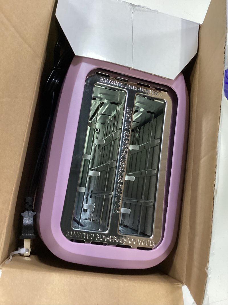 Condition photo showing Good Condition for mainstays 2-slice toaster with 6 shade settings and removable crumb tray, lilac bloom
