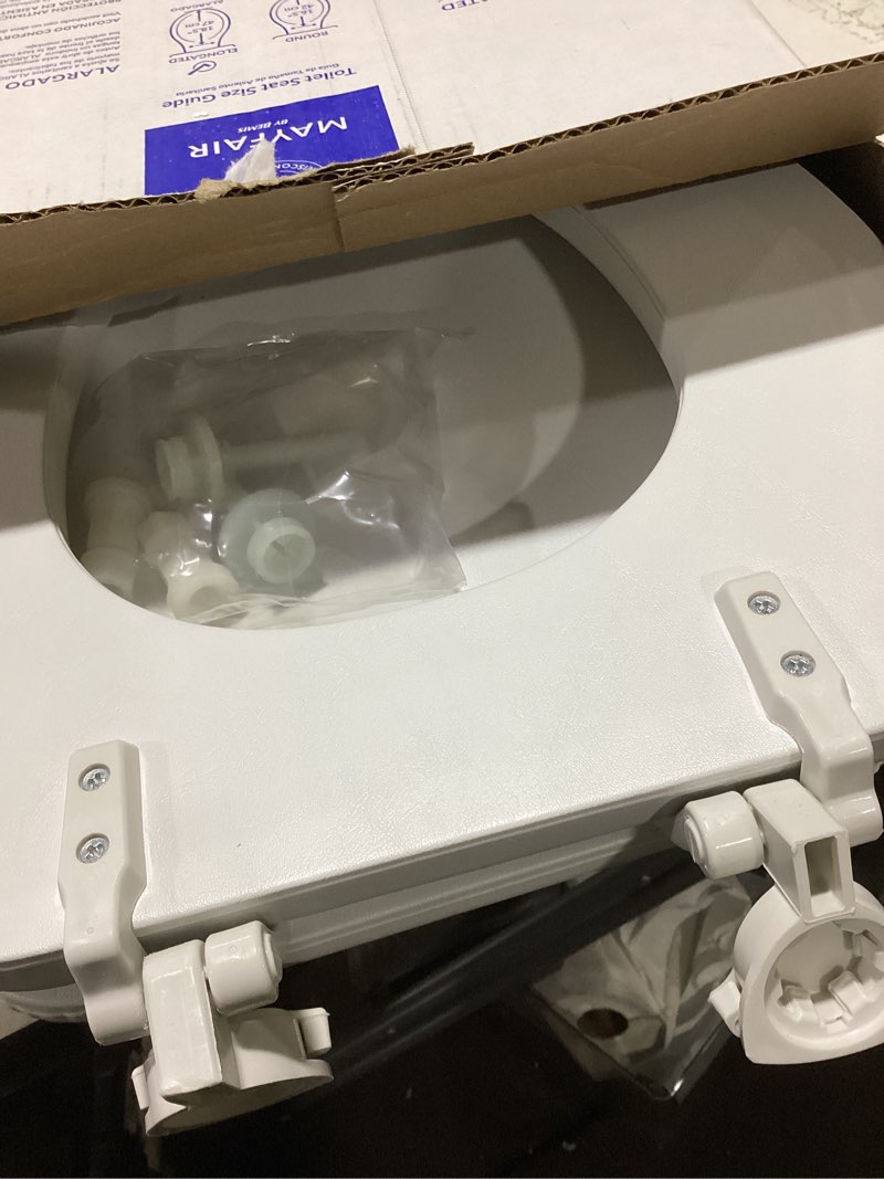 Condition photo showing As Is for mayfair by bemis eden cushioned vinyl white elongated padded toilet seat