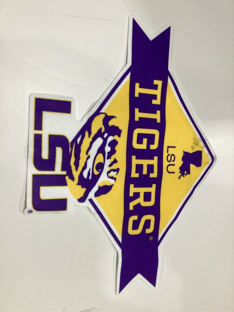 Condition photo showing As Is for Rico Industries NCAA Shape Cut Pennant Shape Cut Pennant - Home and Living Room Décor - Soft Felt EZ to Hang LSU Tigers Diamond