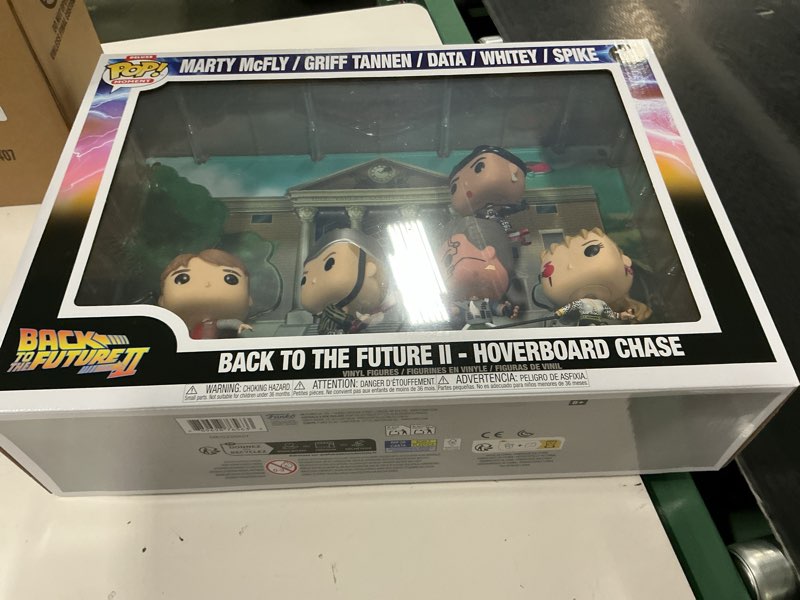 Condition photo showing New/Like New for Funko Pop! Moments Deluxe: Back to The Future 2 - Marty McFly - Hoverboard Chase - Collectable Vinyl