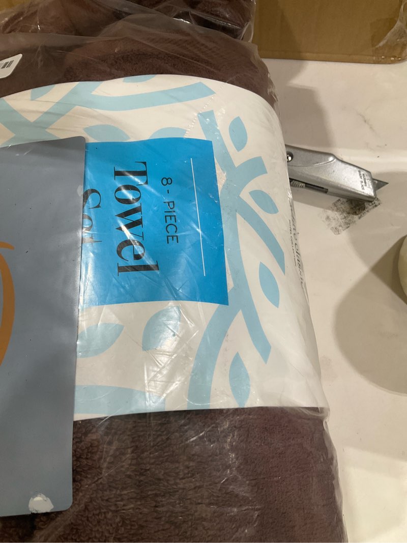 Condition photo showing Good Condition for 8pc brown towel set