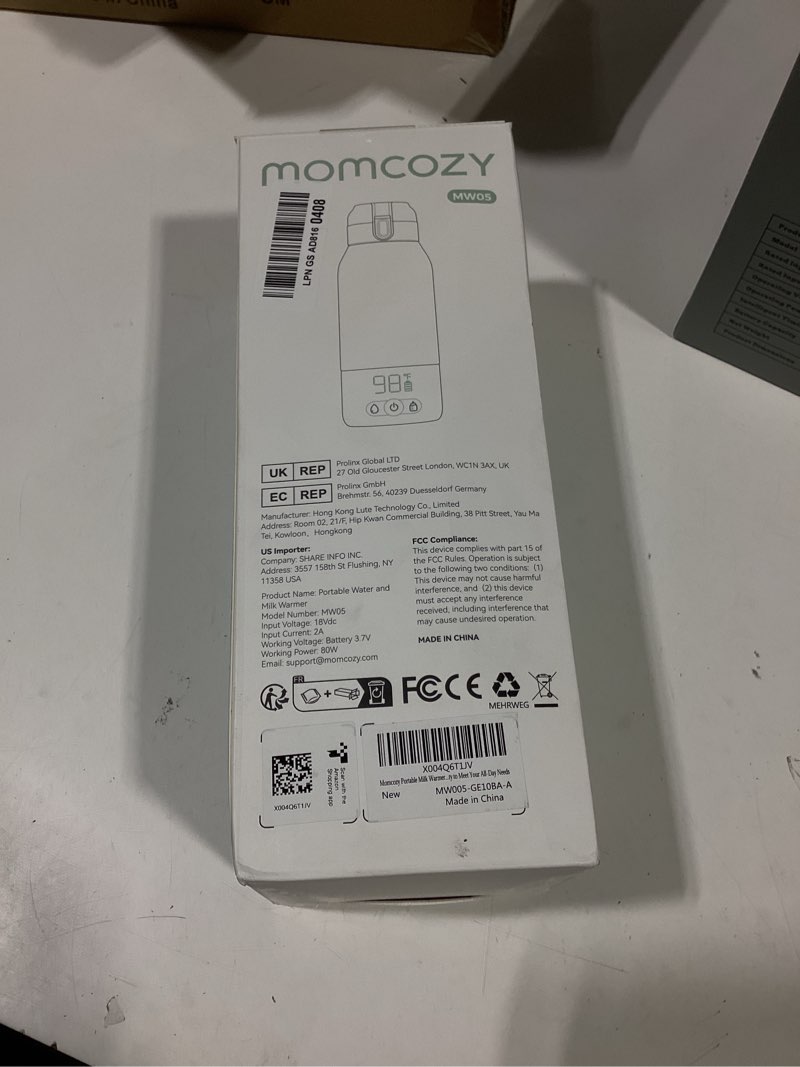 Condition photo showing As Is for momcozy portable bottle warmer for travel – dual heating modes for breast milk & water, portable milk warmer with fast heating & long battery life, 17 ounces large capacity to meet your all-day needs gradual change of green