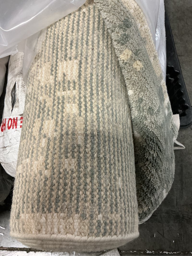 Condition photo showing As Is for mystique teal wool rug - 9x12