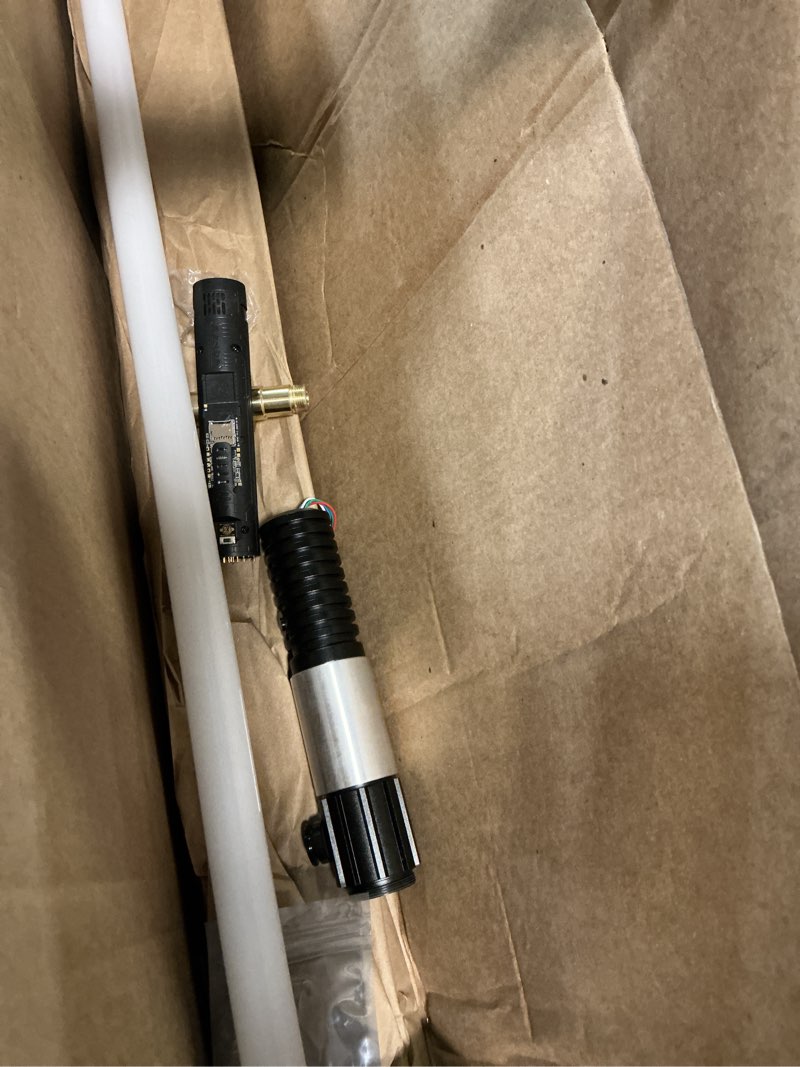Condition photo showing As Is for cvcbser upgrade app control obw dueling lightsaber, 16 sets sound effects 3 light effects and infinite colors change, motion control premium metal light sabers for adults (rgb-obw)