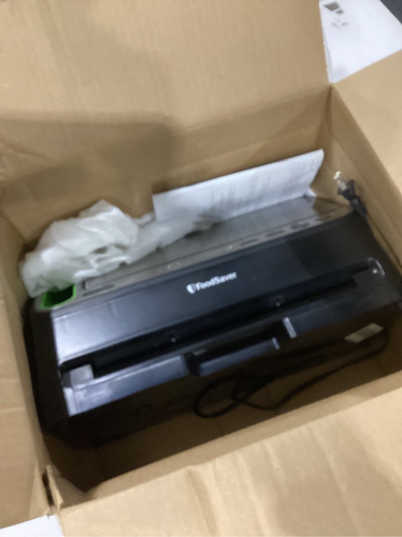 Condition photo showing As Is for FoodSaver V4400 2-in-1 Vacuum Sealer Machine with Automatic Vacuum Sealer Bag Detection and Starter Kit Machine & Starter Kit