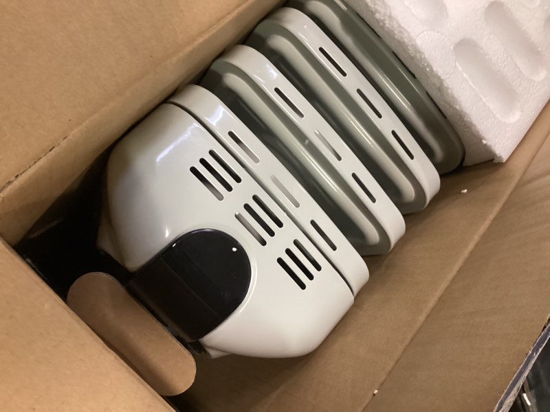 Condition photo showing As Is for Delonghi full  room radiant heater