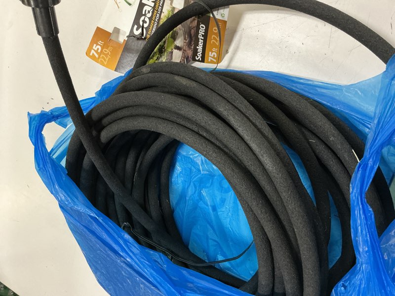 Condition photo showing As Is for element soaker 3/8" x 75' garden hose