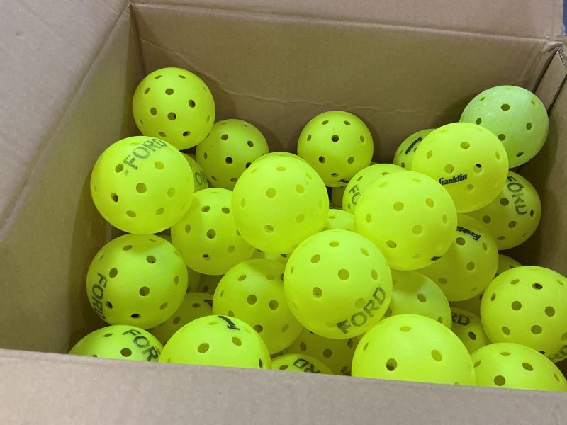Condition photo showing Good Condition for franklin sports x-40 outdoor pickleballs - official ball of usa pickleball, app tour + us open - regulation size 100 pack optic yellow