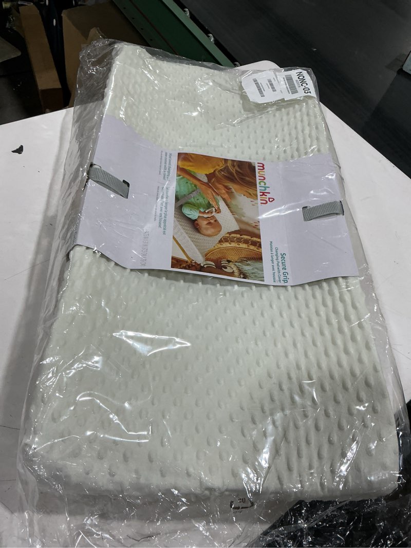Condition photo showing Good Condition for munchkin secure grip diaper changing pad with cover - warm white