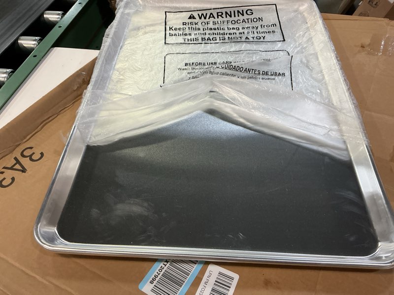 Condition photo showing Good Condition for winco commercial-grade aluminum sheet pan, 16 gauge, full size