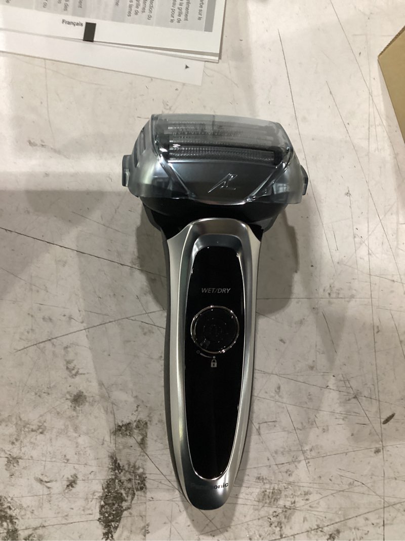 Condition photo showing New/Like New for panasonic arc5 electric razor for men with pop-up trimmer, wet/dry 5-blade electric shaver with intelligent shave sensor and multi-flex pivoting head – es-lv65-s (silver)