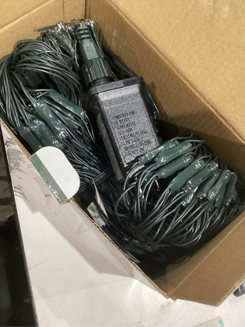 Condition photo showing New/Like New for LitHome 14.8FT x 5FT Led Christmas Net Lights Outdoor, 300 LED Multicolor Christmas Net Lights for Bushes Connectable, 8 Modes Colorful Giant Mesh Light Green Wire for Yard, Garden, Party, Tree Decor Multicolor 300LED / 14.8FT x 5FT