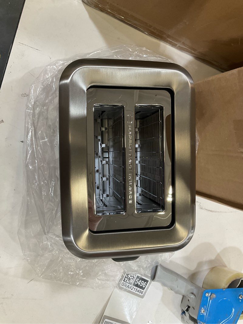Condition photo showing New/Like New for breville bta720xl bit more toaster, 2 slice, brushed stainless steel