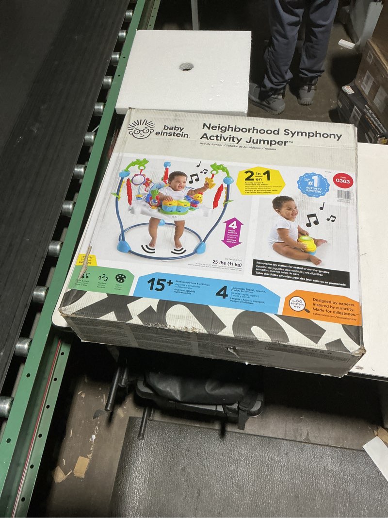 Condition photo showing New/Like New for Baby Einstein Neighborhood Symphony Activity Baby Jumper Activity Center, Infant Entertainer with Lights and Melodies, Age 6 Months +, Max Weight 25 lbs., Unisex Comfy Clean