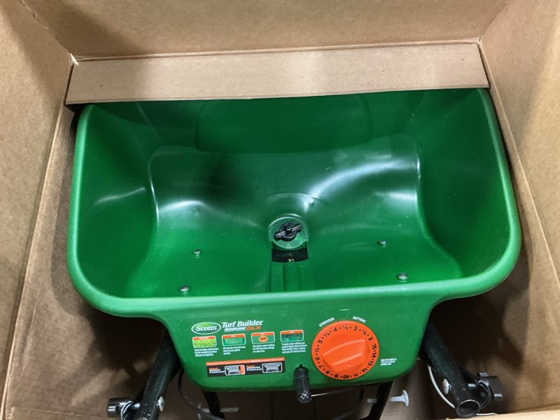 Condition photo showing Good Condition for scotts turf builder edgeguard dlx broadcast spreader for seed, fertilizer, salt, ice melt, holds up to 15,000 sq.ft. product deluxe