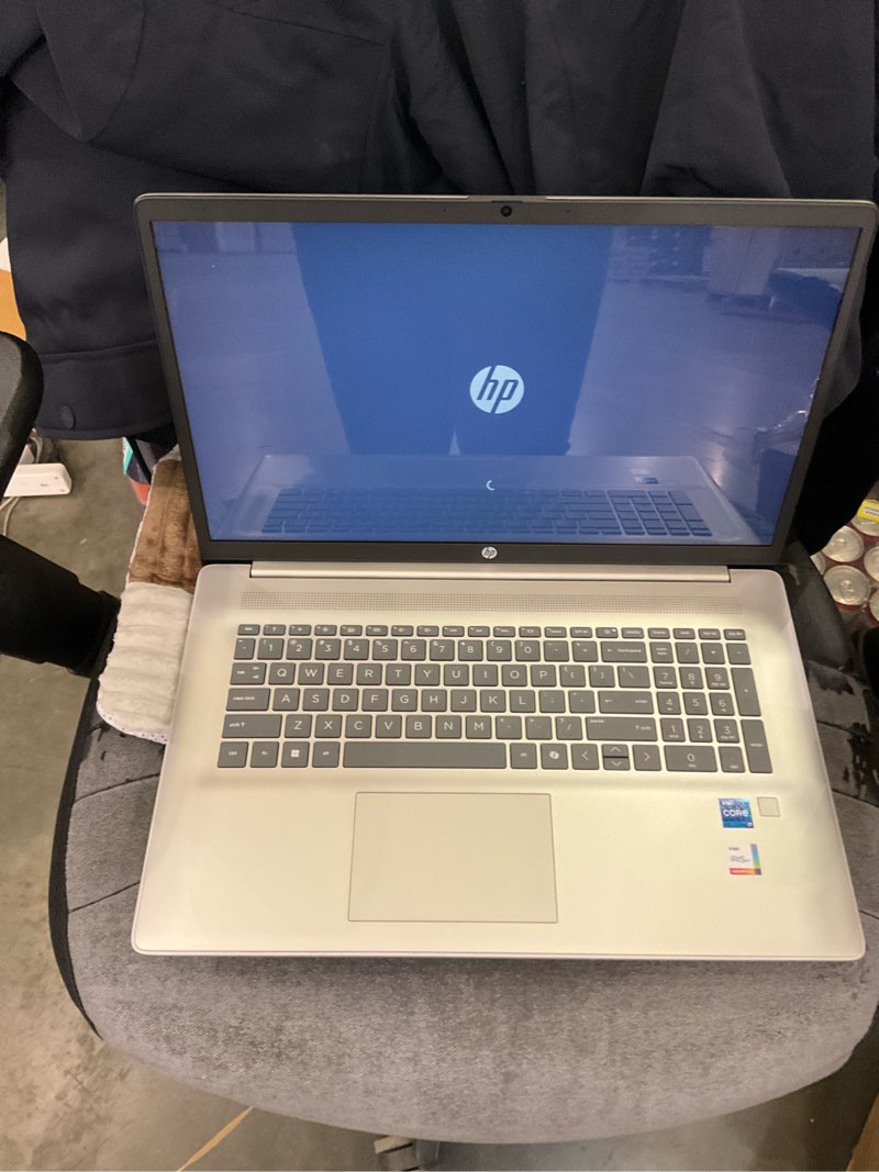 Condition photo showing New/Like New for HP 17.3 inch Laptop, FHD Display, Intel Core i5-1334U, 16 GB RAM, 512 GB SSD, Intel Iris Xe Graphics, Windows 11 Home, Natural Silver, 17-cn3399nr Paint finish cover and base, sandblasted In-mould roll keyboard frame