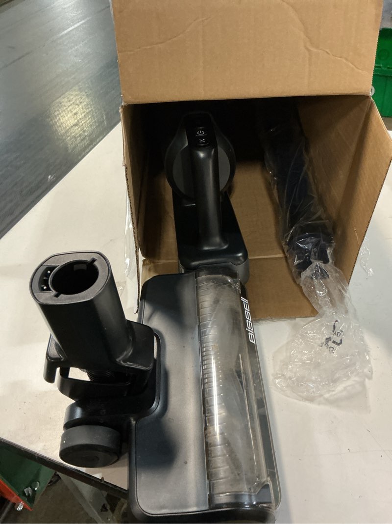 Condition photo showing As Is for bissell powerclean furfinder 200w self-standing cordless vacuum w/tangle free brush roll, strong suction, removeable battery, wall mount, upholstery tool & bright headlights