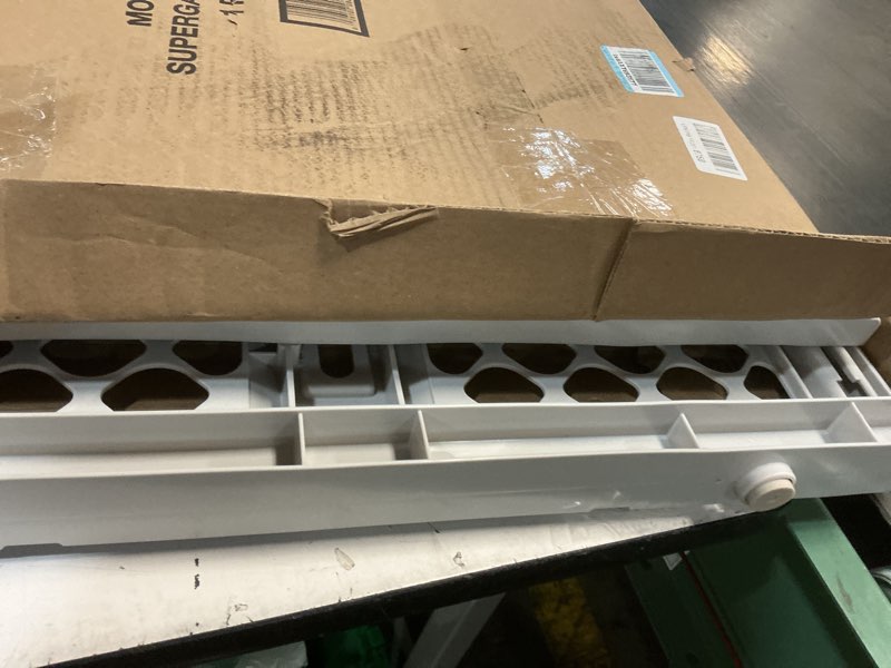 Condition photo showing As Is for mypet north states universal pet gate: 26” - 42” wide dog gate. use as pressure mounted gate or swinging door with included hardware. dog gates for doorways, 26" tall, gray