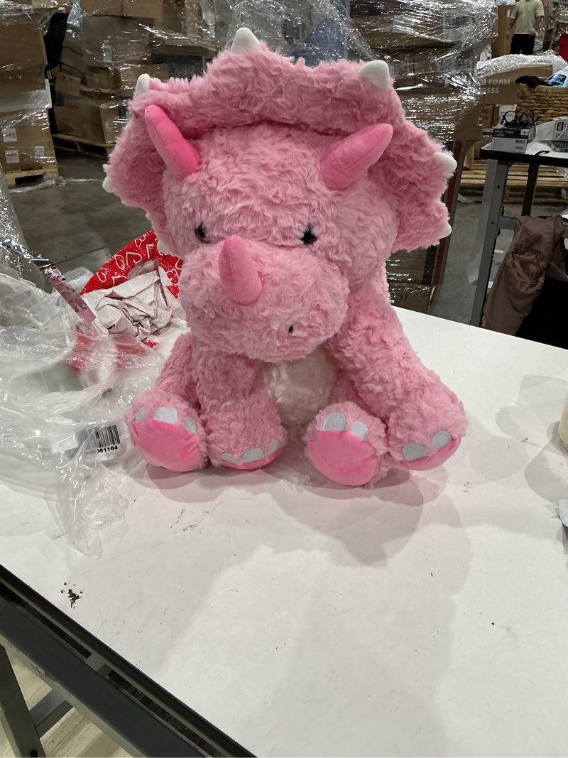 Condition photo showing Good Condition for item similar// tezituor large pink dinosaur stuffed animals, stuffed dinosaur plush toys for boys girls, hugging soft dino triceratops plush pillow praty valentine's day gift for girlfriend