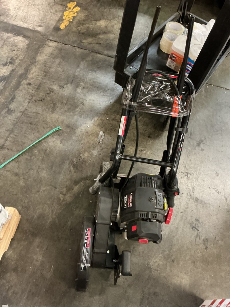 Condition photo showing As Is for 9 in. 46 cc gas powered 4-cycle walk behind landscape edger