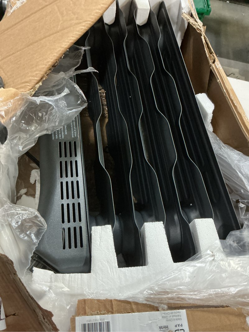 Condition photo showing Good Condition for amazon basics oil space heater, portable radiator heater with 7 oil-filled fins for indoor use, 3 heat settings, thermostat, tip-over protection, etl safety certificate, manual control, 1500w, black