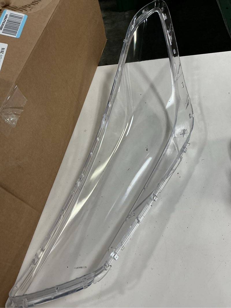 Condition photo showing As Is for transparent, unbranded car headlight lens cover replacement (unknown make and model)