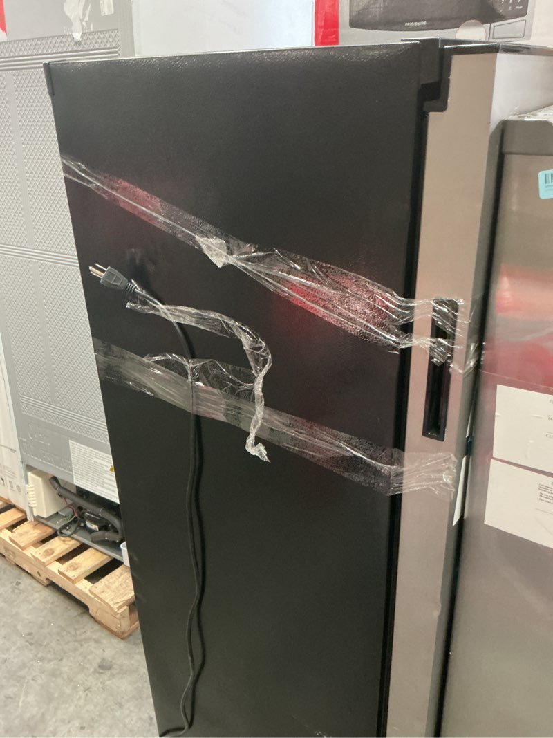 Condition photo showing As Is for FGFRF1008  10 cu. ft. Gallery Upright Freezer