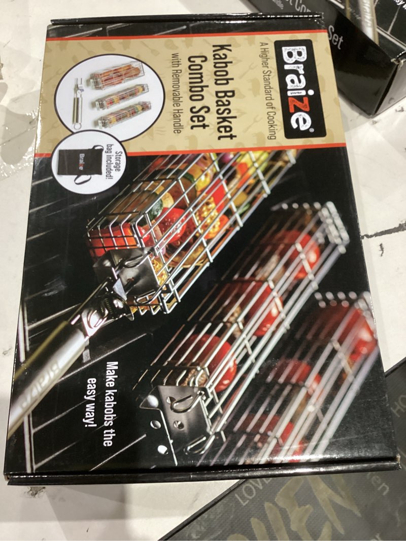 Condition photo showing New/Like New for Large Kabob Grilling Basket with Removable Handle. Stainless Steel construction with a Larger Capacity (12 x 2 x 2) and secure easy latch lid. (3-Piece Set – Bag & Sponges Included)