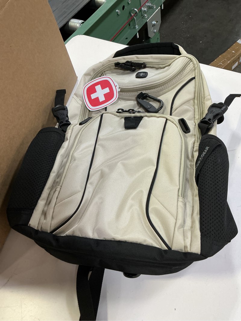 Condition photo showing New/Like New for swissgear mini 1900 scansmart slim version laptop backpack, oatmeal, 16-inch 16-inch oatmeal