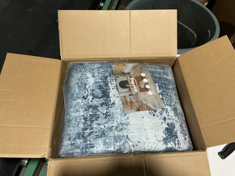 Condition photo showing New/Like New for amada homefurnishing 9x12 area rugs for living room, modern large area rugs with non-slip backing & low pile, neutral soft washable rug for nursery, bedroom, dinning room, playroom, dark blue dark blue 9' x 12' (rectangular)