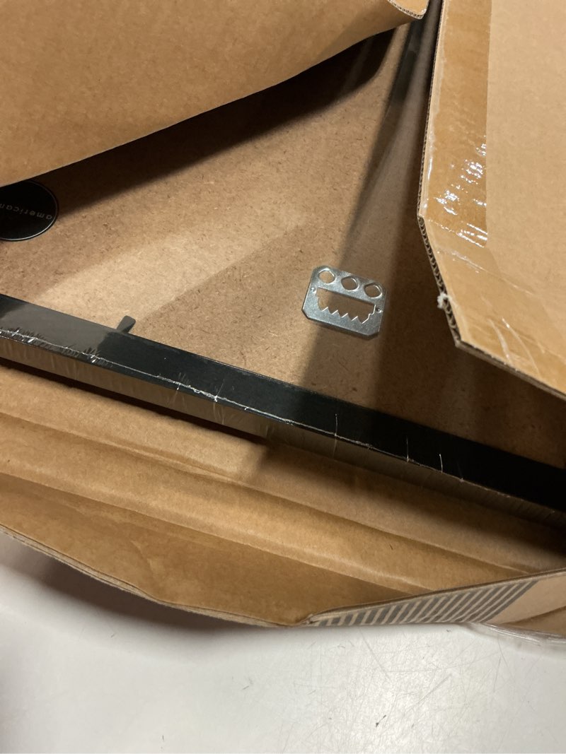 Condition photo showing New/Like New for americanflat 12x18 poster frame with shatter-resistant glass - signature collection - gallery-style frames made of engineered wood - photo frame for wall display - black 12x18 black
