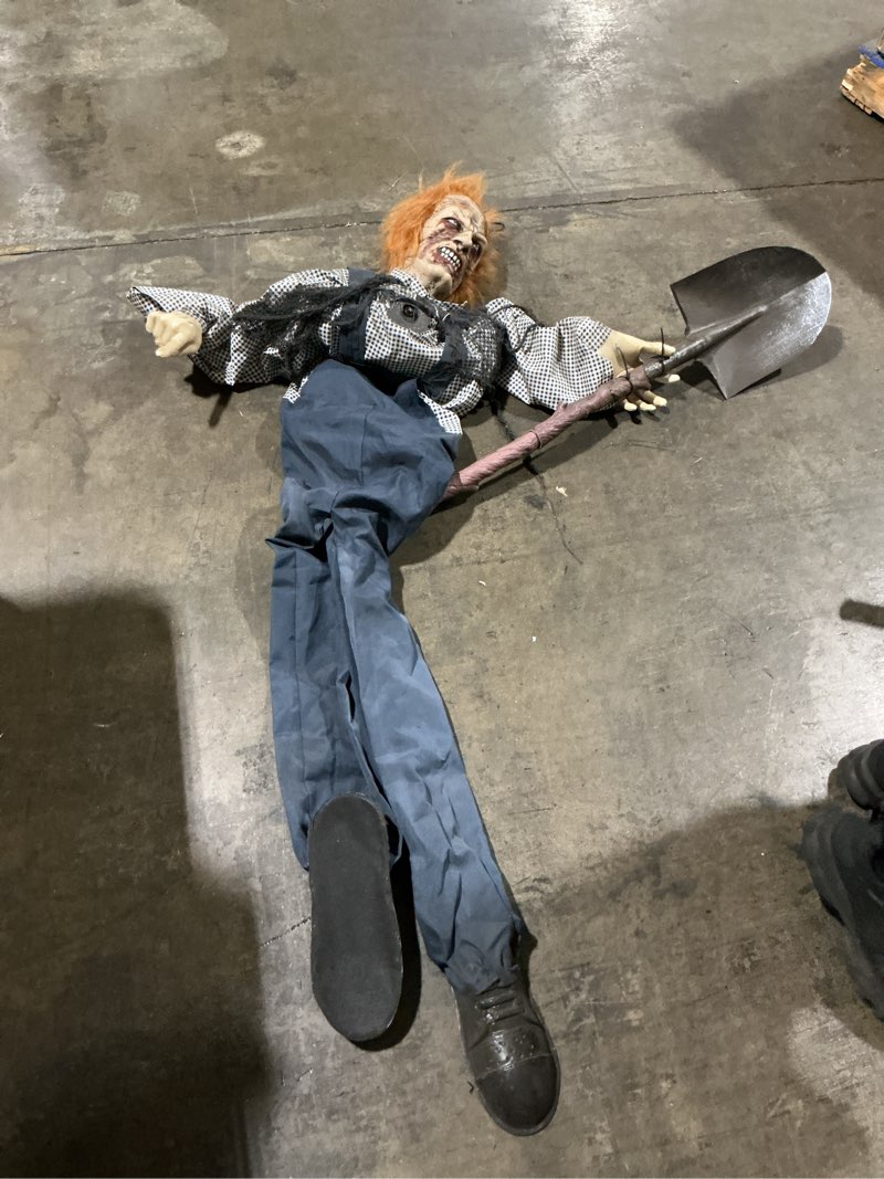 Condition photo showing As Is for (broken head) haunted hill farm 5.25 ft lifesize animatronic evil grave digger with lights and sound, halloween decoration