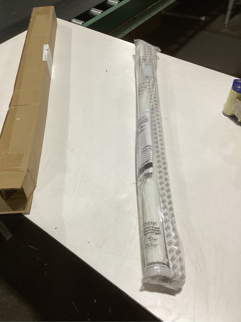 Condition photo showing Good Condition for Joydeco Cordless Zebra Blinds for Windows, Dual Layer Light Control Window Blinds with Light-Proof Aluminum Cover, Free-Stop Roller Shades for Home & Office (White,34" W x 75" H) Upgrade- White (Aluminum Cover) 34"W x 75"H